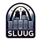 The St. Louis Unix Users Group Logo is a moderately complex illustration of the Gateway Arch above a city skyline where the buildings have been made to look like server hardware. The letters S-L-U-U-G in a banner at the bottom.