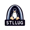 The St. Louis Linux Users Group Logo is a relatively simple illustration of the Linux Penguin beneath the Gateway Arch. The letters S-T-L-L-U-G appear in a banner at the bottom.